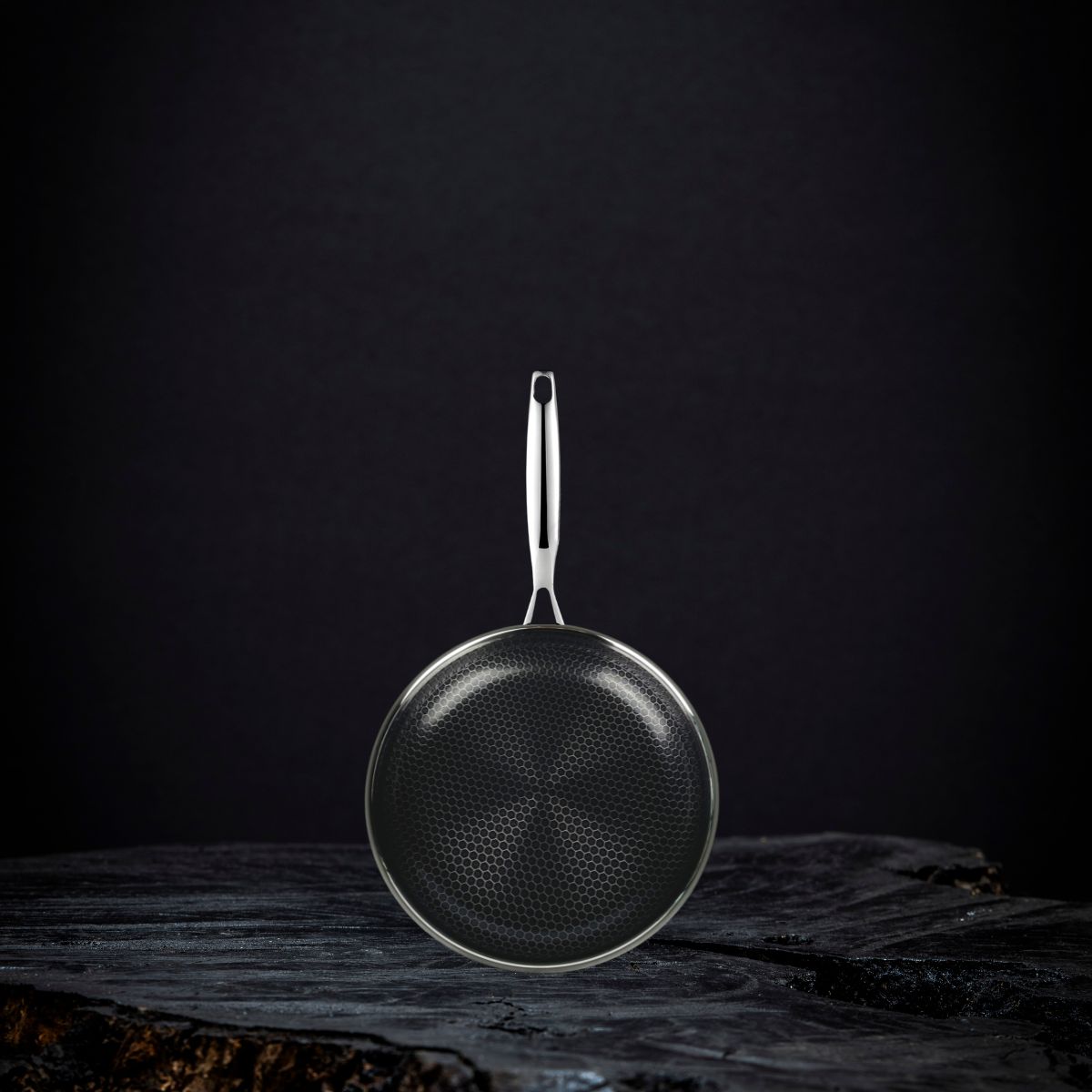 A single green leaf against a white background.